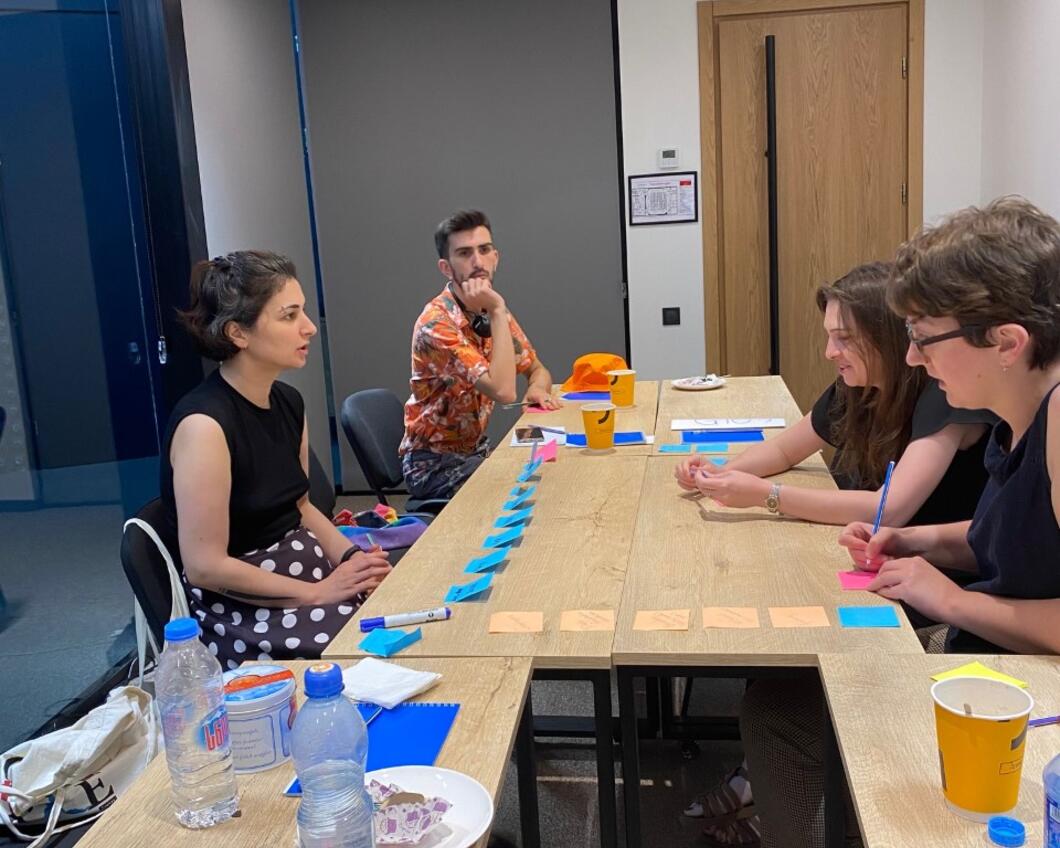 Our Georgian partnersusing post-its during a deep-dive session